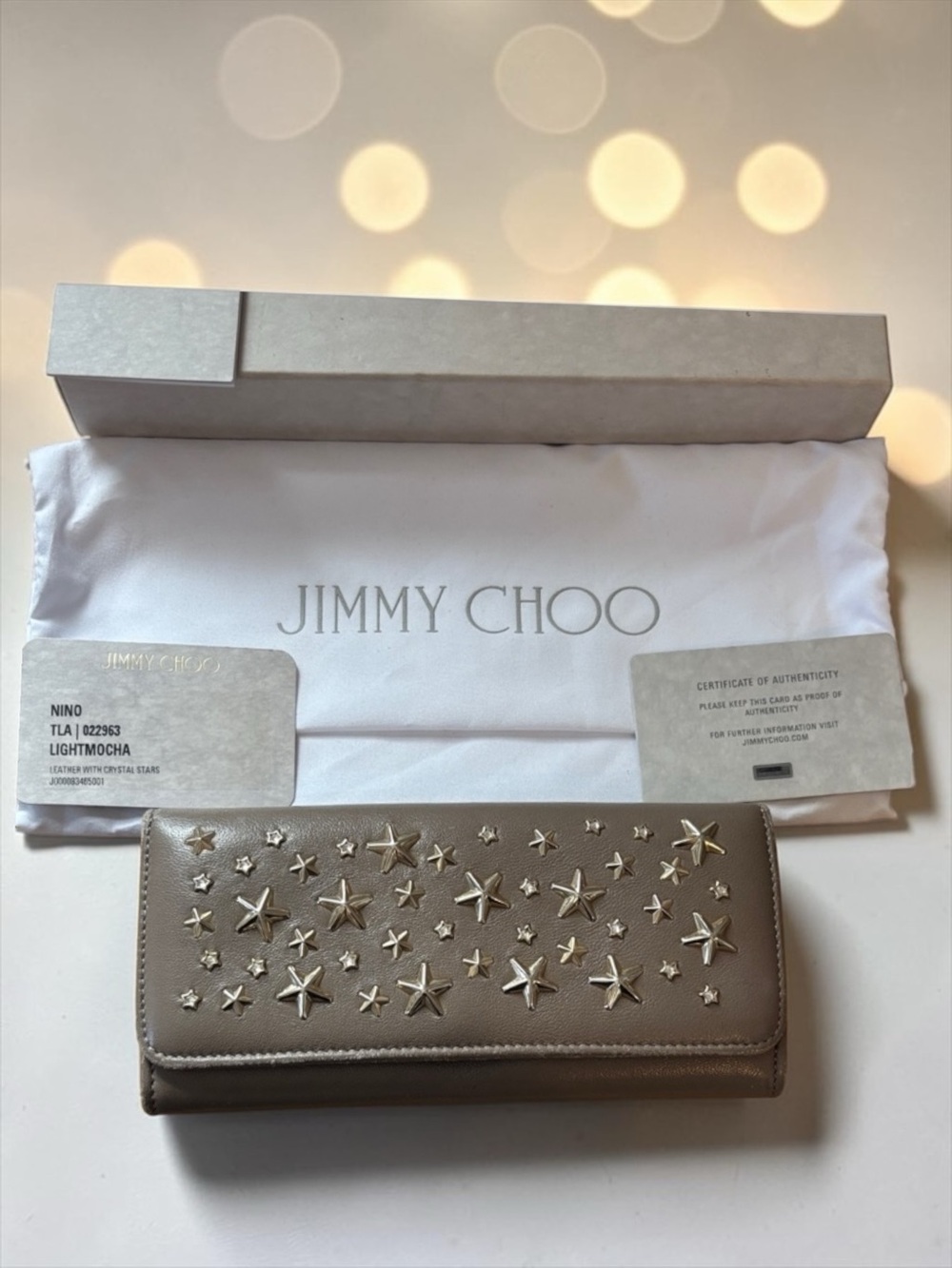 Jimmy Choo Light Mocha Leather Star-Studded Long Wallet. Full inclusion
